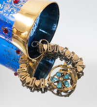 Load image into Gallery viewer, Antique gold filled blue flower rhinestone assemblage bracelet on Victorian book chain

