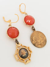 Load image into Gallery viewer, Antique bronze religious medals dangle earrings on orange beads
