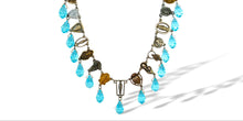 Load image into Gallery viewer, Antique religious medals assemblage necklace with blue crystal drops
