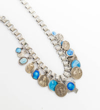Load image into Gallery viewer, Vintage religious blue enamel Miraculous medals loaded assemblage bib necklace on book chain
