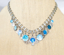 Load image into Gallery viewer, Vintage religious blue enamel Miraculous medals loaded assemblage bib necklace on book chain
