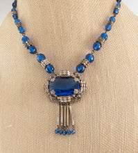 Load image into Gallery viewer, Vintage cobalt blue Czech glass and brass filigree Max Neiger? art deco pendant necklace with fringe signed gifts for her

