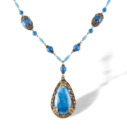 Stunning art deco blue satin Czech glass and brass necklace.